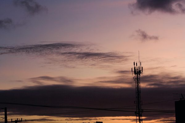 Cell Tower in a sunset landscape, artistically illustrating the title 3G Sunset