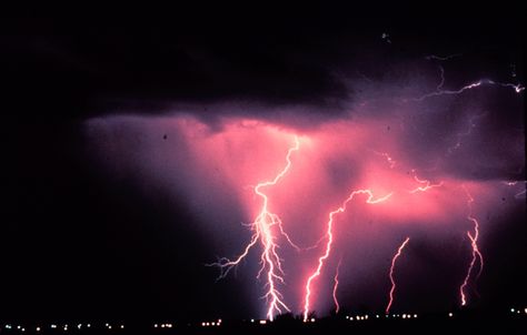 Lightning in a dark night sky. Illustrating extreme weather not suitable for security cameras