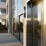 Modern apartment entrance with video intercom and keyless access reader