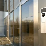 Commercial intercom system at a modern business entrance